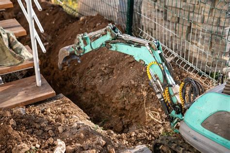 how to dig a trench with a mini excavator|digging deep trenches with kubota mini.